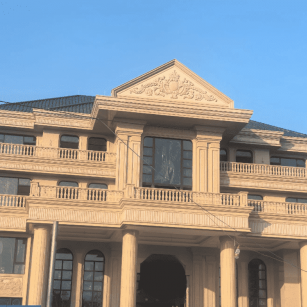 贺州黄金麻别墅外墙干挂石材效果示例