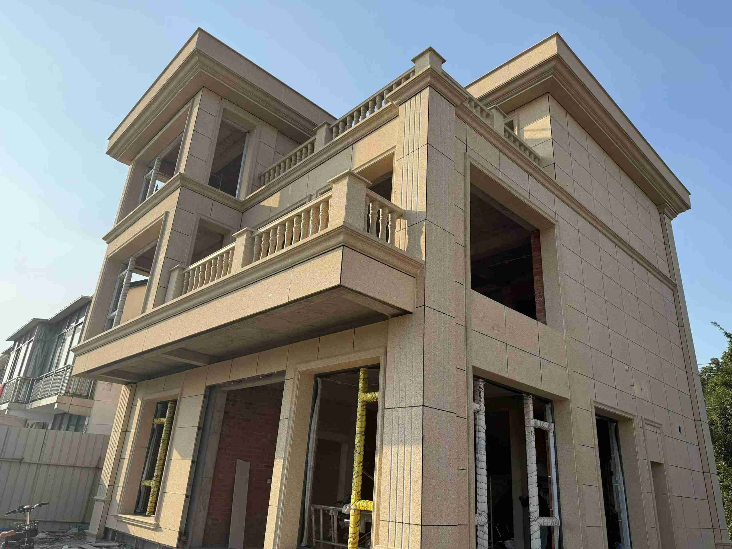 贺州 黄金麻花岗岩石材荔枝面外墙干挂效果展示